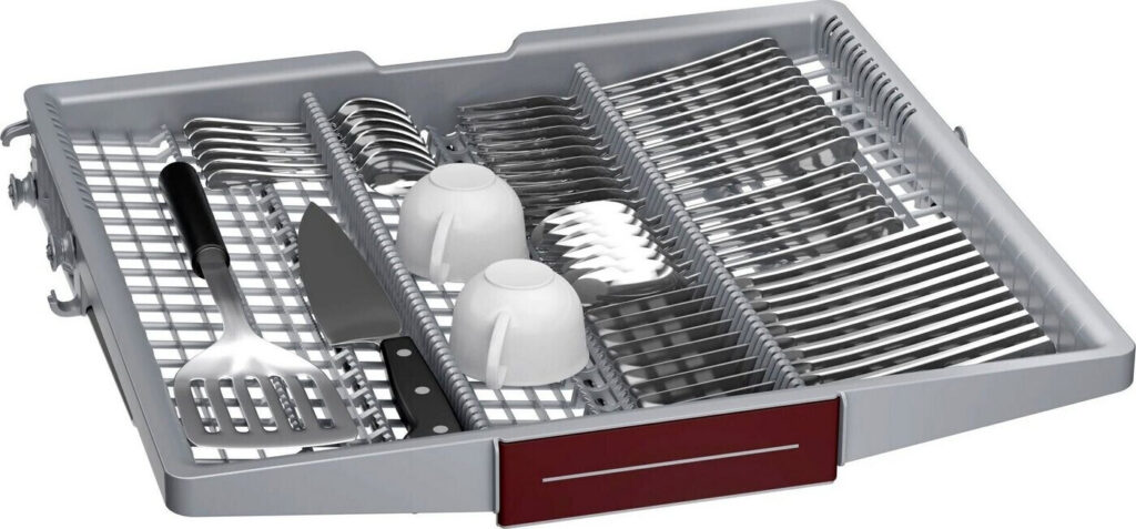 Le support du NEFF S155ECX06E organise efficacement les couverts, peut accueillir deux tasses blanches et contient un couteau ainsi qu'une spatule.