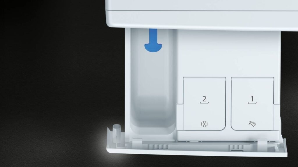 Gros plan d'un compartiment ouvert dans la machine à laver SIEMENS WG44G2F2FR, présentant une flèche bleue et des emplacements étiquetés numérotés 1 et 2 pour les réglages ou les commandes.