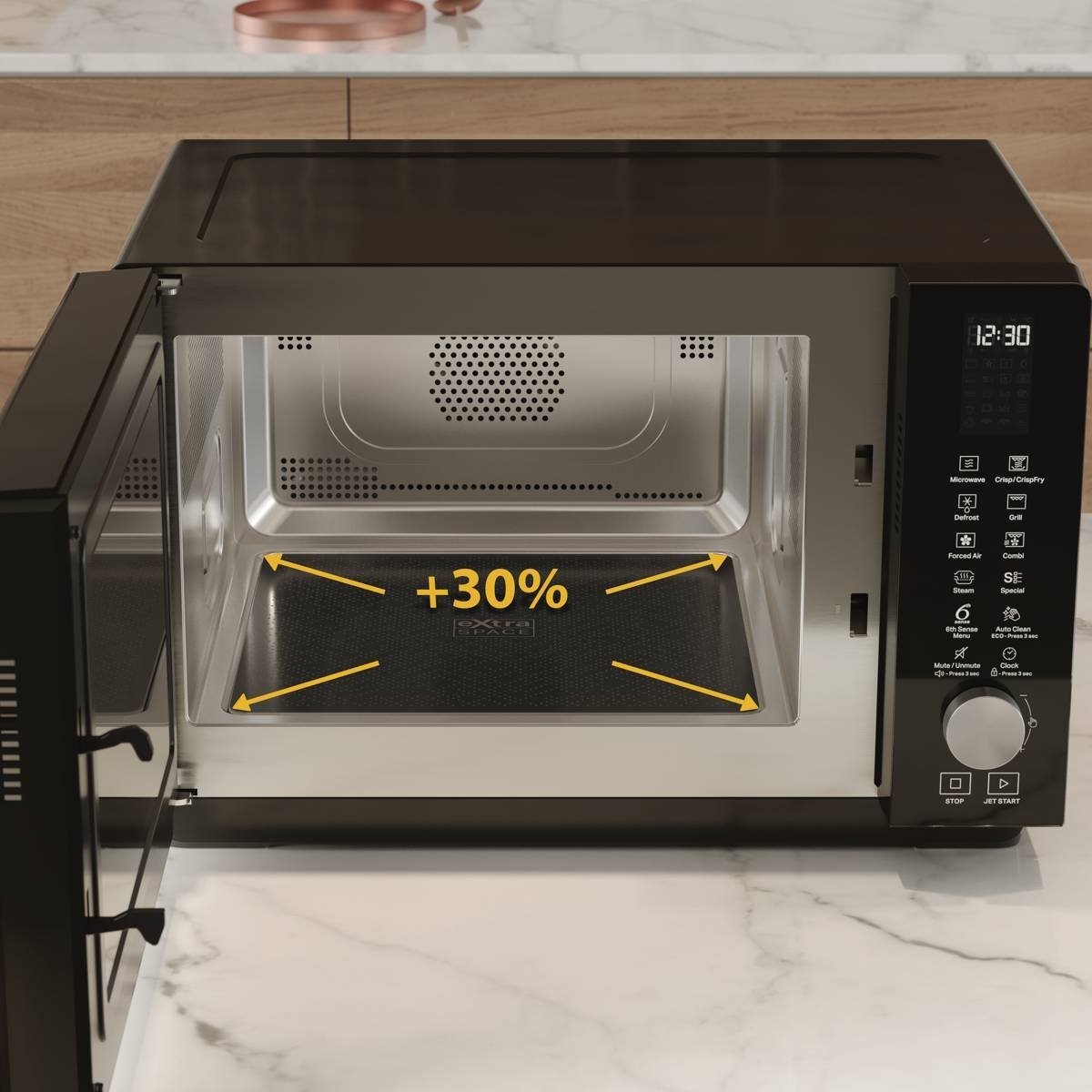 Le micro-ondes WHIRLPOOL MWF427BL, doté d'un intérieur 30 % plus grand, est élégamment placé sur un comptoir en marbre.