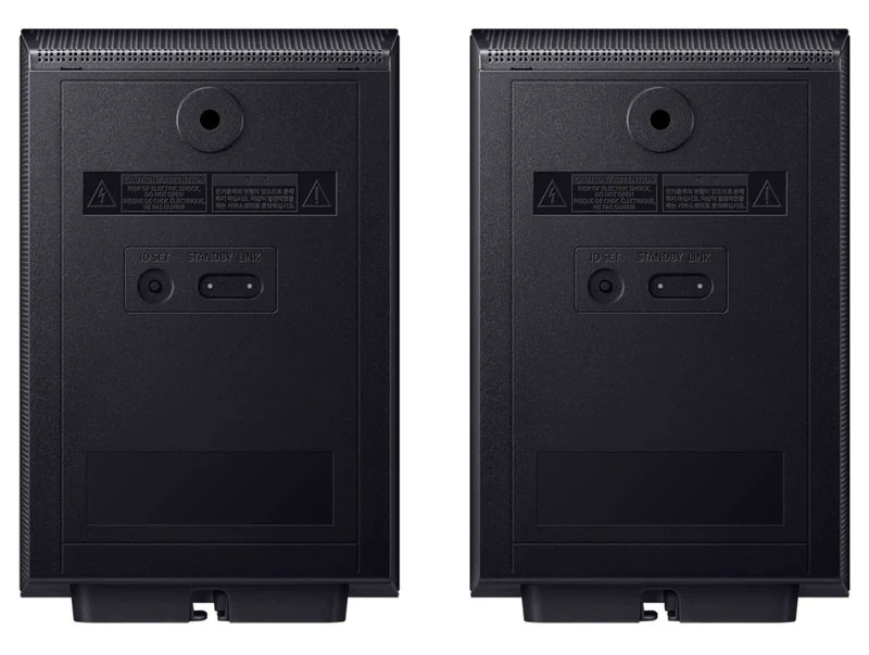 Vue arrière de deux enceintes électroniques rectangulaires noires identiques avec ports de connexion et étiquettes, compatibles avec le SAMSUNG HW-Q995D (Copie).