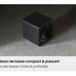 Un caisson de basses compact noir SAMSUNG HW-Q995D (Copie) repose sur une surface grise, avec un texte français soulignant ses basses profondes et puissantes.