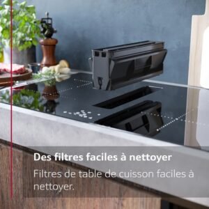 Découvrez l'élégance des appareils modernes dans une cuisine raffinée avec la table de cuisson à induction NEFF V57THQ4L0 et sa hotte aspirante. Elle est complétée par un four encastrable pour un espace culinaire parfait.