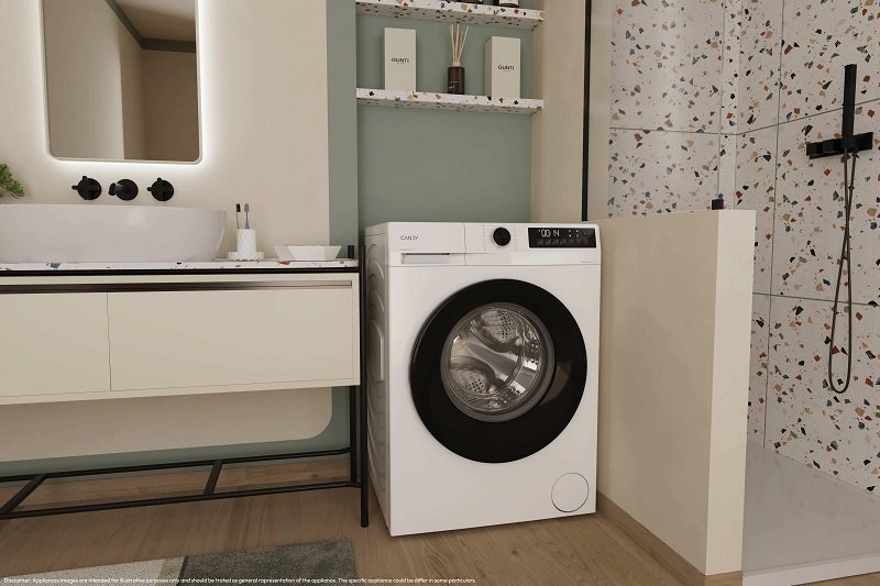 Une buanderie moderne comprenant la machine à laver à chargement frontal blanche CANDY GD49B8-S à côté d'un évier et d'un espace douche.