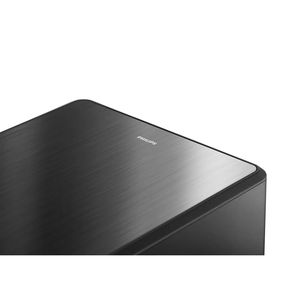 Gros plan sur le PHILIPS TAFW1/10, un appareil électronique noir élégant avec une finition en métal brossé.