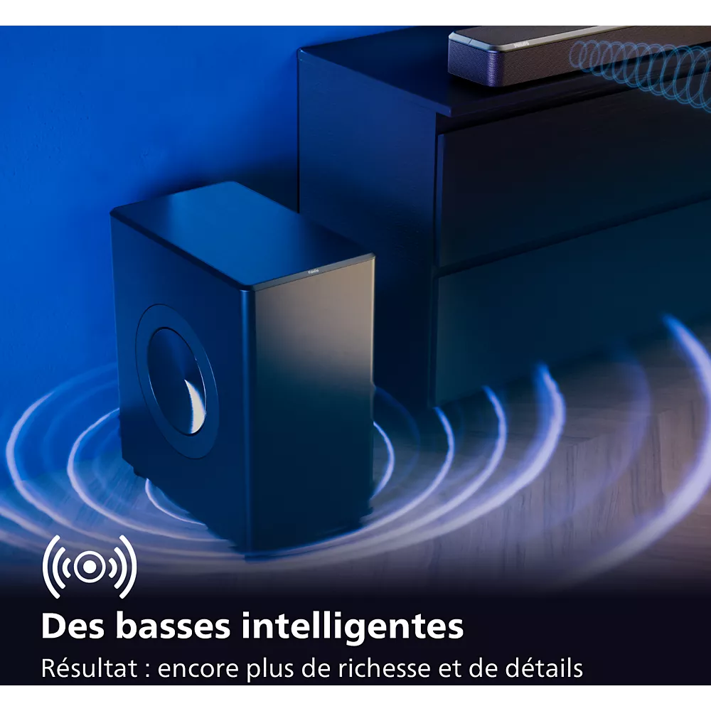 Le caisson de basse PHILIPS TAFW1/10 délivre des ondes sonores accompagnées d'un texte en français mettant en valeur ses basses intelligentes, riches et détaillées.