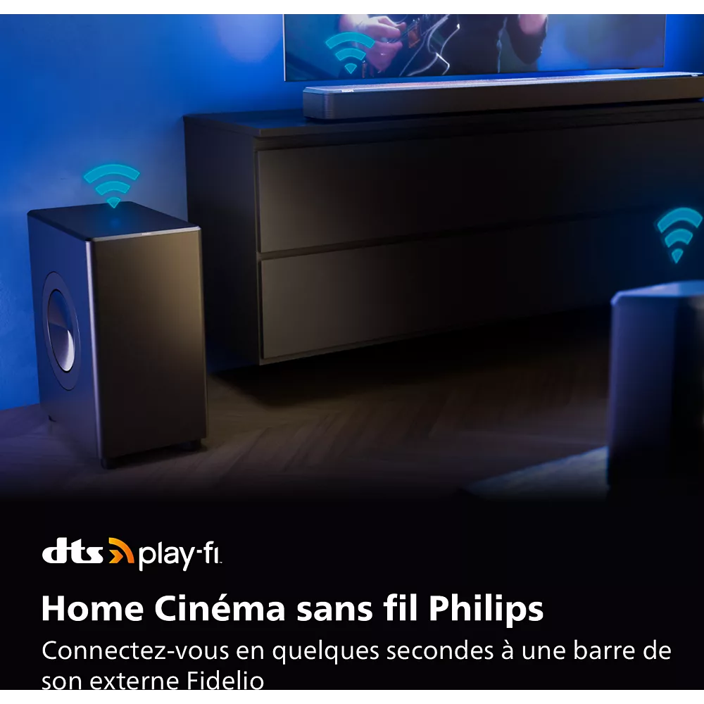Le PHILIPS TAFW1/10 est un système home cinéma sans fil avec haut-parleur et barre de son, logo DTS Play-Fi et texte en français.