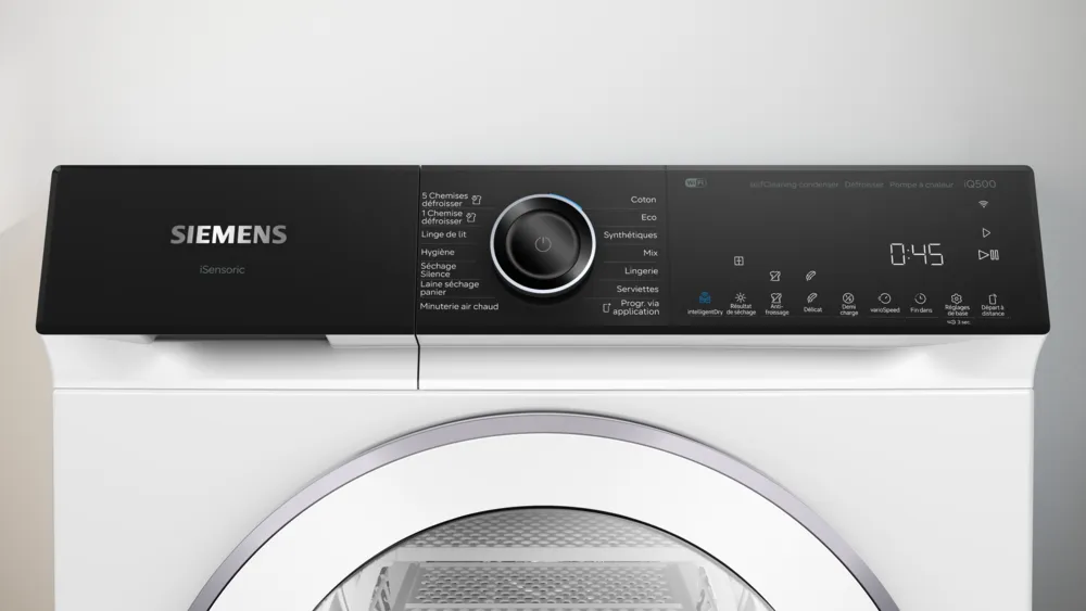 Gros plan du panneau de commande du lave-linge SIEMENS WQ46H2CAFR montrant les différents réglages de lavage et une minuterie numérique.