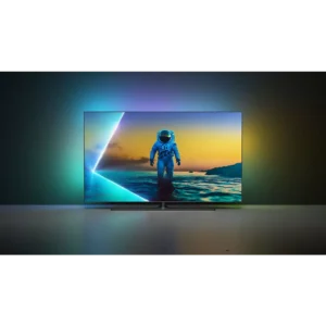 Un téléviseur PHILIPS 55OLED850/12 OLED affiche un astronaute debout dans l'eau, éclairé par des lumières colorées vibrantes derrière l'écran.