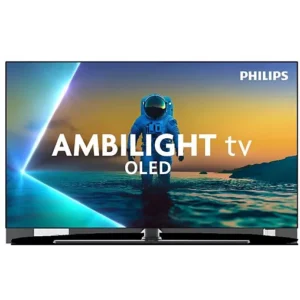Le téléviseur PHILIPS 65OLED850/12 OLED affiche un astronaute debout dans une eau peu profonde au coucher du soleil, avec des couleurs vibrantes et des détails impressionnants.