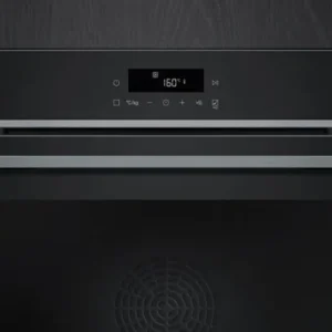 Gros plan sur le four encastrable SIEMENS HB472G0B3F, dont l'affichage numérique est réglé sur 160°C.