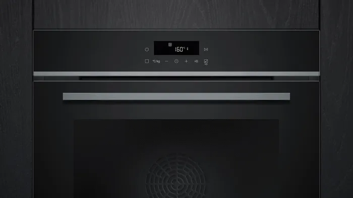 Gros plan sur le four encastrable SIEMENS HB472G0B3F, dont l'affichage numérique est réglé sur 160°C.