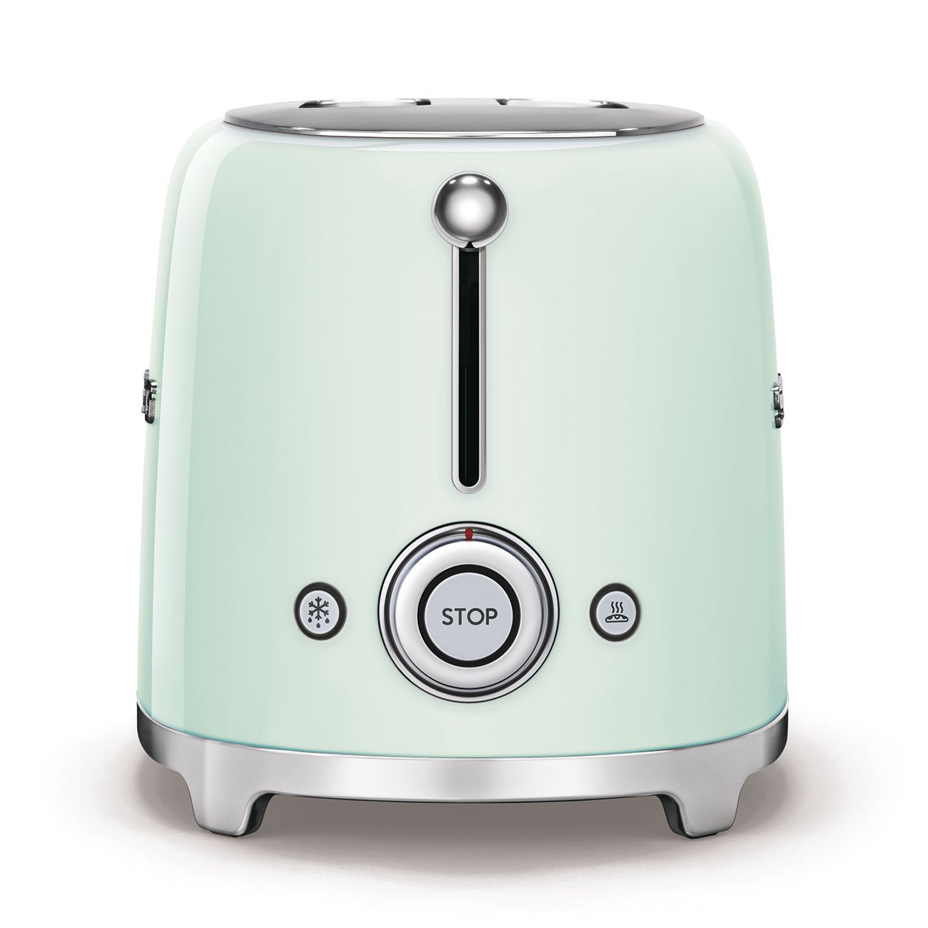 Le SMEG TSF01PGEU VERT D'EAU est un grille-pain vert clair avec des accents chromés et des boutons frontaux pour l'arrêt, la décongélation et le réchauffage.