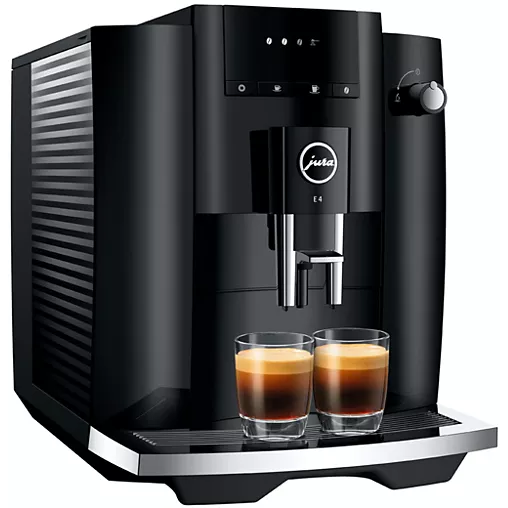 La JURA E4 PIANOBLACK distribue deux expressos dans des tasses en verre transparent.