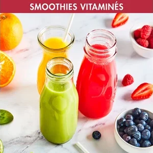 Trois smoothies vibrants réalisés avec le MAGIMIX 11630, remplis d'oranges, de fraises, de framboises et de myrtilles fraîches.