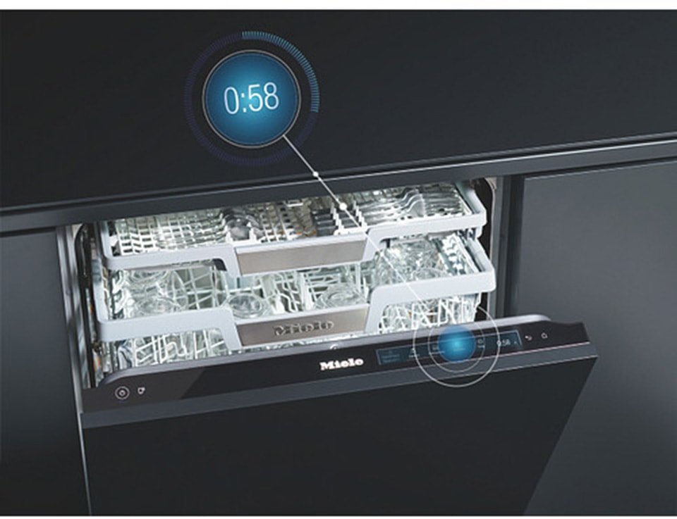 Ouvrez le lave-vaisselle MIELE G 5863 SCVI EXCELLENCE avec un affichage digital de la minuterie indiquant 58 secondes restantes dans le cycle de lavage.