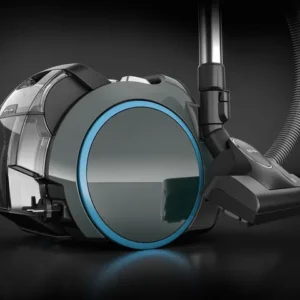 Le Miele BOOST CX1 POWERLINE est un aspirateur-traîneau moderne au design épuré et rond avec un anneau bleu sur la roue.