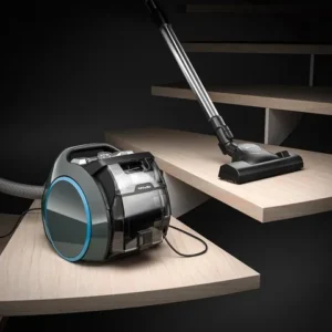 L'aspirateur-traîneau BOOST CX1 POWERLINE de Miele est présenté sur un escalier flottant en bois, utilisant son tuyau et son embout pour nettoyer efficacement une marche.