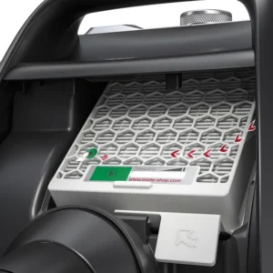 Gros plan sur le filtre HEPA de l'aspirateur Miele BOOST CX1 POWERLINE, avec son motif en nid d'abeille et ses boutons indicateurs POWERLINE.