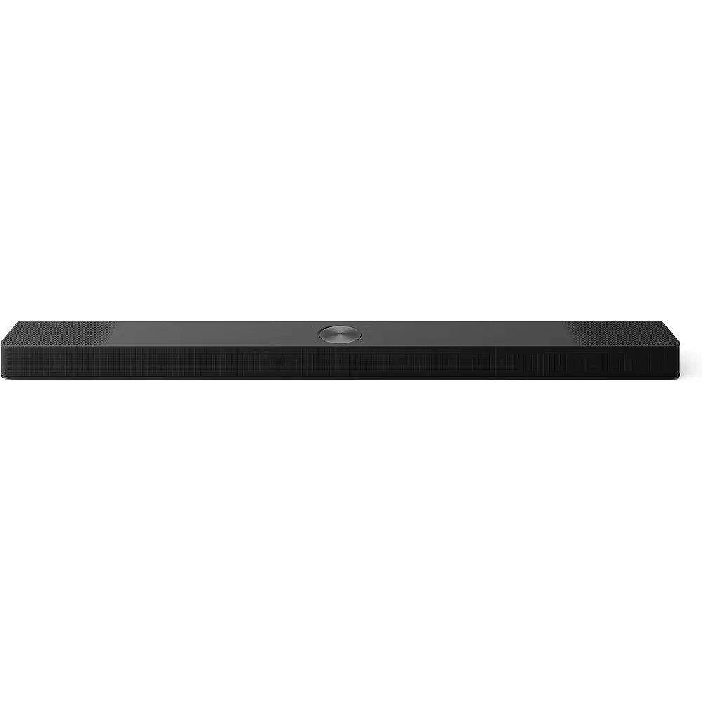 La LG S95TR est une barre de son noire et fine, avec un logo circulaire au centre, affiché sur un fond blanc.