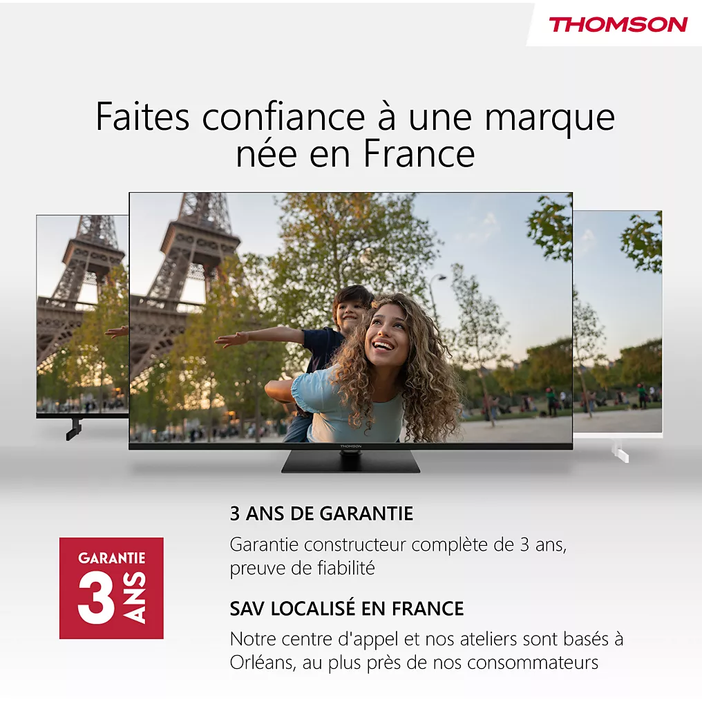 Un téléviseur THOMSON 32HA4M44 montre une femme et un enfant souriant devant la Tour Eiffel, soulignant l'héritage électronique français de THOMSON.