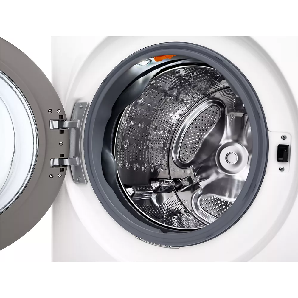 Ouvrez le lave-linge à chargement frontal LG F20F12WST pour découvrir son tambour en acier inoxydable spacieux et vide à l'intérieur.