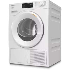 Sèche-linge à chargement frontal MIELE TSC643WP blanc avec affichage numérique et bouton de commande, photographié de biais.