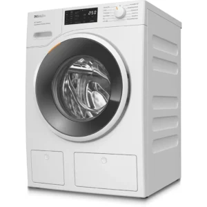 Le MIELE WSG883WCS est un lave-linge à chargement frontal doté d'un affichage numérique, d'un bouton de commande et d'un tambour en acier inoxydable.