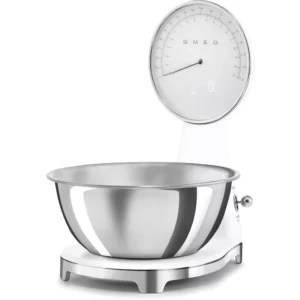 La SMEG KSC01BLMWW (Copie) est une balance de cuisine blanche avec un grand bol en acier inoxydable et un affichage à cadran analogique.