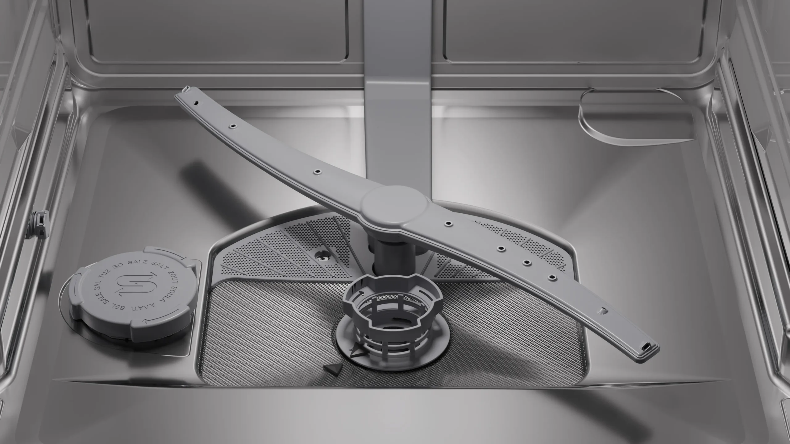 Gros plan sur le fond intérieur du lave-vaisselle SIEMENS SN63EX05ME, mettant en évidence les composants du bras d'aspersion et du filtre.