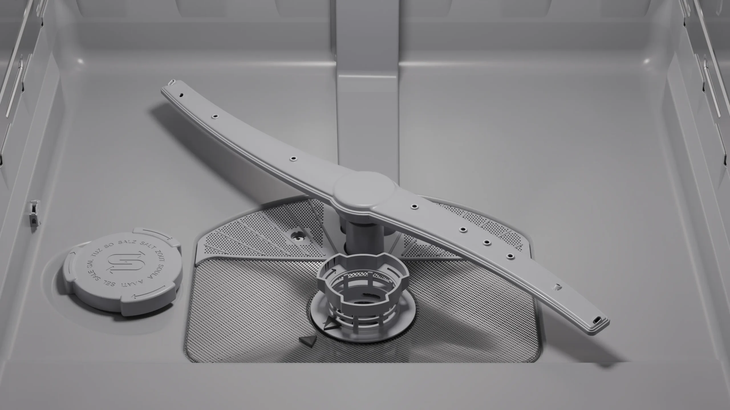 Gros plan du fond intérieur d'un lave-vaisselle SIEMENS SN55ES12CE (Copie), montrant le bras d'aspersion et le filtre de vidange.