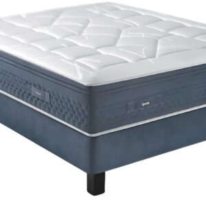 Gros plan sur le matelas EPEDA PERSÉIDES 2 160x200, avec son plateau blanc moelleux et son sommier bleu foncé posé sur des pieds noirs.