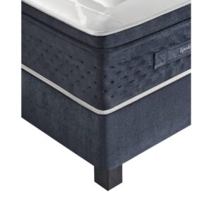 Vue d'angle du matelas EPEDA PERSÉIDES 2 160x200 en bleu foncé avec un plateau blanc, présenté avec un sommier tapissier bleu assorti sur des pieds noirs.