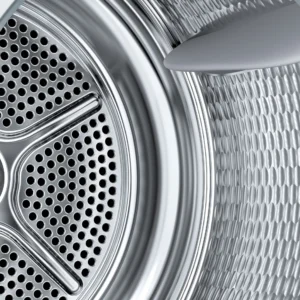 Gros plan sur l'intérieur du tambour du sèche-linge BOSCH WTH8520MFR, mettant en évidence le métal perforé et les ailettes.