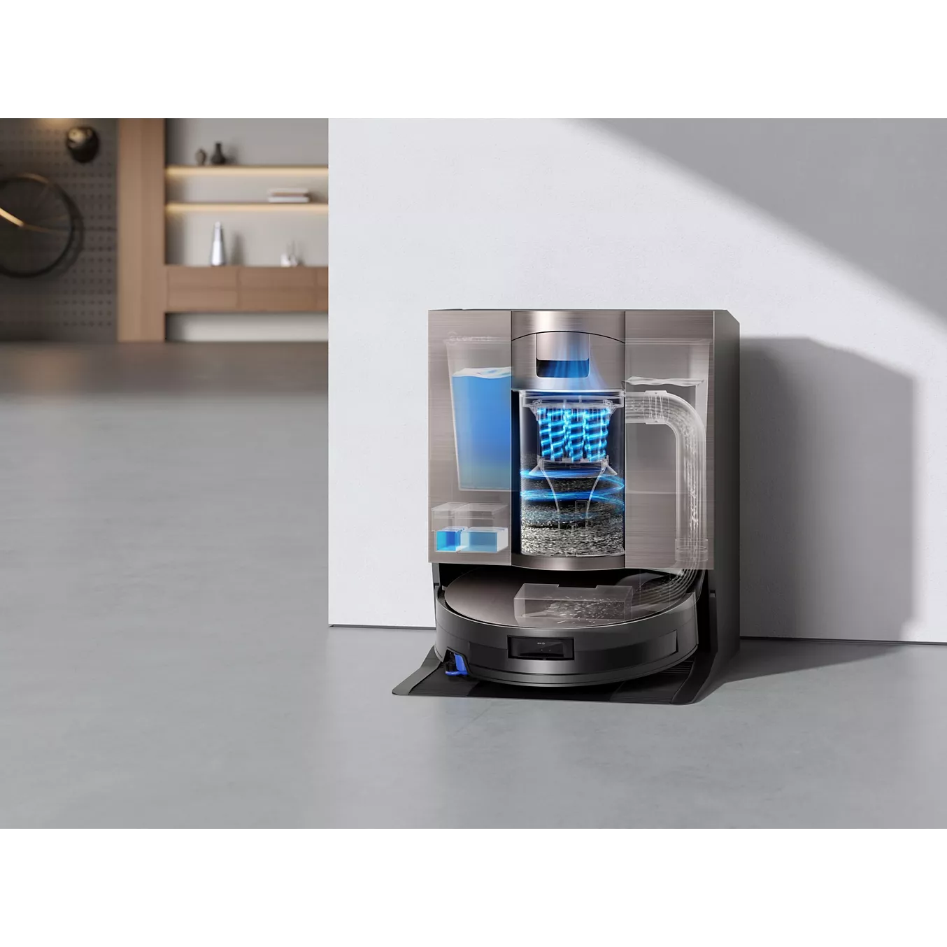 L'aspirateur robotique omni ECOVACS X11 est présenté dans sa station d'accueil avec une vue en coupe, mettant en évidence sa technologie interne avancée pour un nettoyage efficace de la maison.