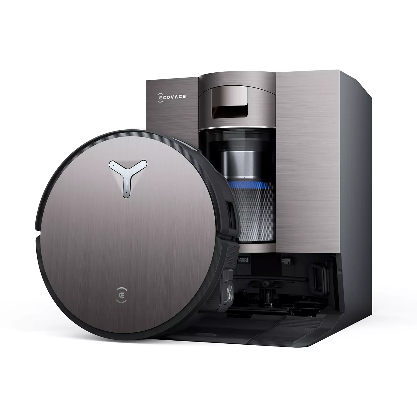 L'ECOVACS X11 omni, un aspirateur robot rond à la finition métallique, est installé dans sa station de charge et de nettoyage élégante, prêt à nettoyer les sols sans effort.