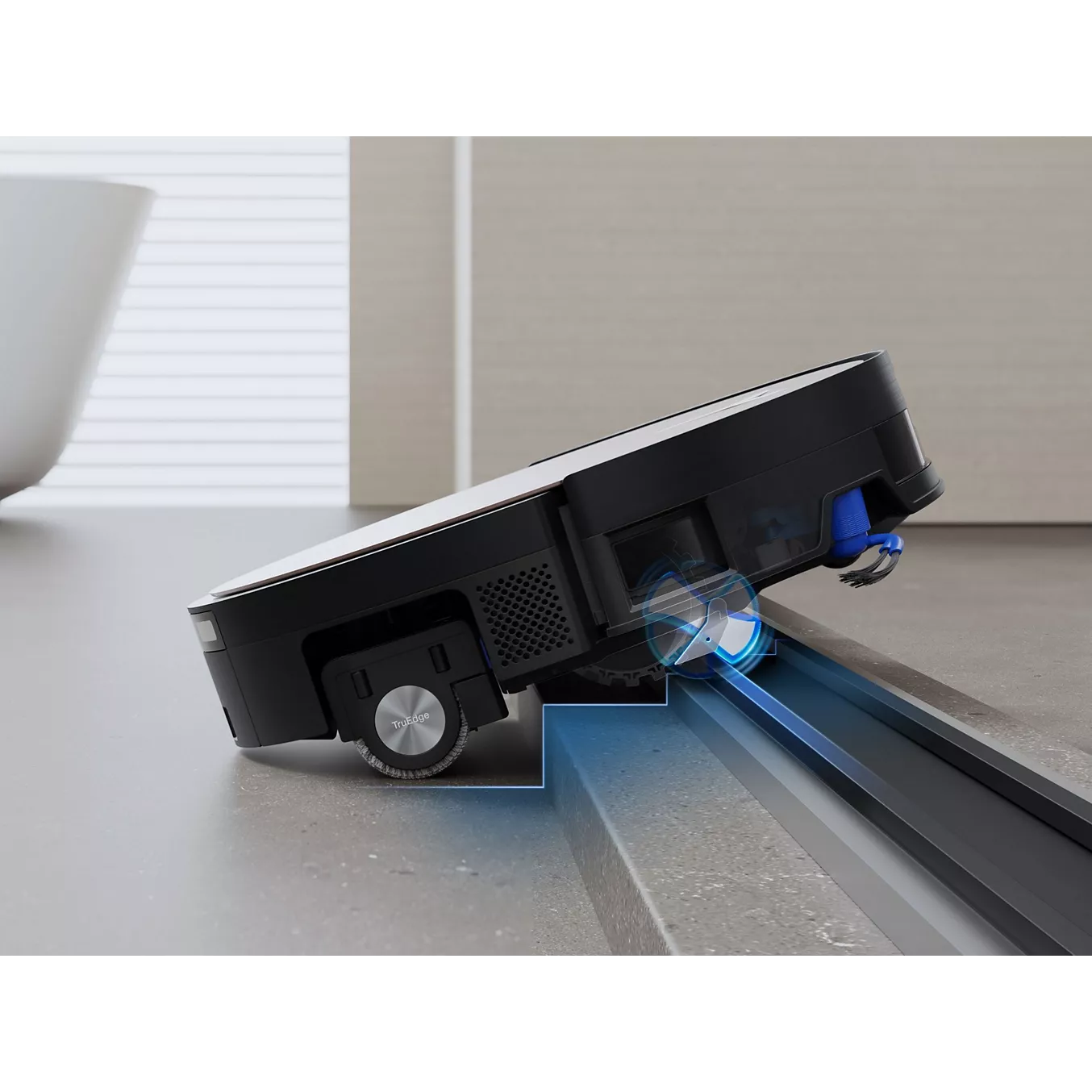 L'ECOVACS X11 omni utilise des capteurs avancés pour détecter et naviguer sur les bords des sols surélevés, assurant ainsi un nettoyage complet et efficace des sols.