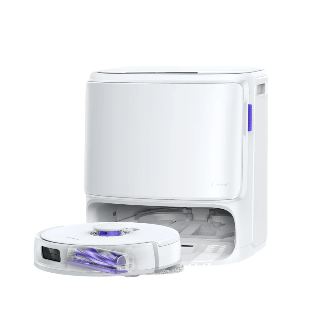 Un aspirateur robot NARWAL FREO Z10 PRO est placé dans sa station d'accueil blanche pour le nettoyage et la recharge automatiques.