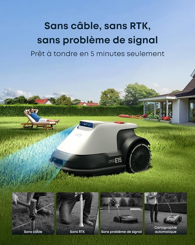 Le robot tondeuse EUFY E15 tond l'herbe pendant qu'une personne se détend sur une chaise longue dans un jardin ensoleillé.
