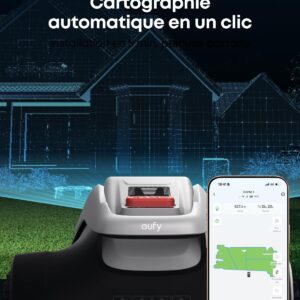 Une tondeuse robotisée EUFY E15 à côté d'un smartphone montrant une carte de la pelouse avec un texte en français sur la cartographie automatique.