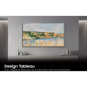 Un téléviseur SAMSUNG TQ65S99H affichant un paysage encadré est suspendu au-dessus d'une console grise moderne au décor minimaliste.