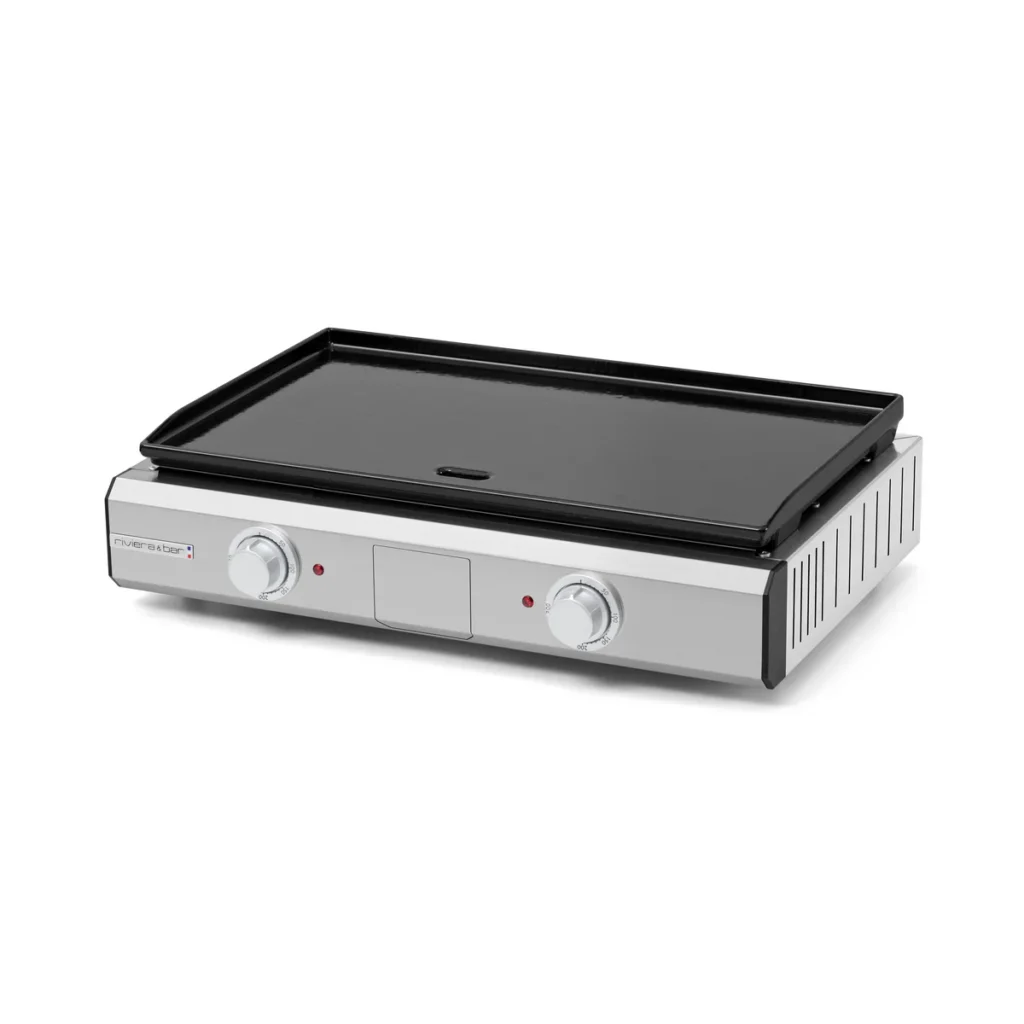 La RIVIERA & BAR QPL1060 est une plaque de cuisson électrique en acier inoxydable équipée de deux boutons de commande et d'une surface de cuisson noire mate et élégante, ce qui en fait un appareil indispensable pour cuisiner facilement et en tout confort.