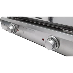 Gros plan sur la plaque de cuisson en acier inoxydable RIVIERA & BAR QPL1060, mettant en évidence ses deux boutons de commande situés à l'avant et ses voyants lumineux.