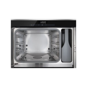 Le four MIELE DG6019NR est doté d'un intérieur ouvert en acier inoxydable, d'un panneau de commande situé sur le dessus et d'une enceinte de cuisson vide.