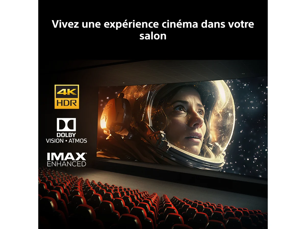 Une femme coiffée d'un casque spatial apparaît sur grand écran ; les logos 4K HDR, True RGB, Dolby et IMAX scintillent au-dessus des rangées de sièges vides de la salle de cinéma. Plongez au cœur d'une expérience cinématographique exceptionnelle grâce à l'écran révolutionnaire SONY K-65XR95M2 True RGB.