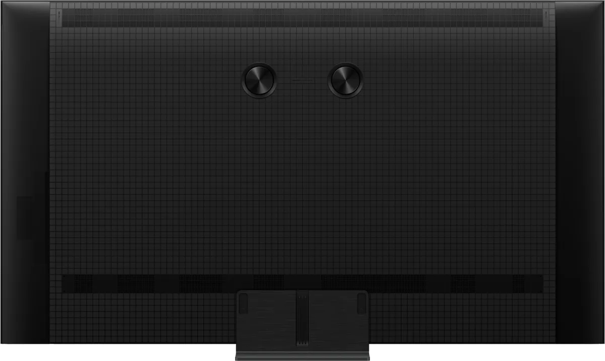 Vue arrière du téléviseur TCL 65C6K PRO, mettant en avant sa texture en damier, ses deux évents circulaires et son socle central.