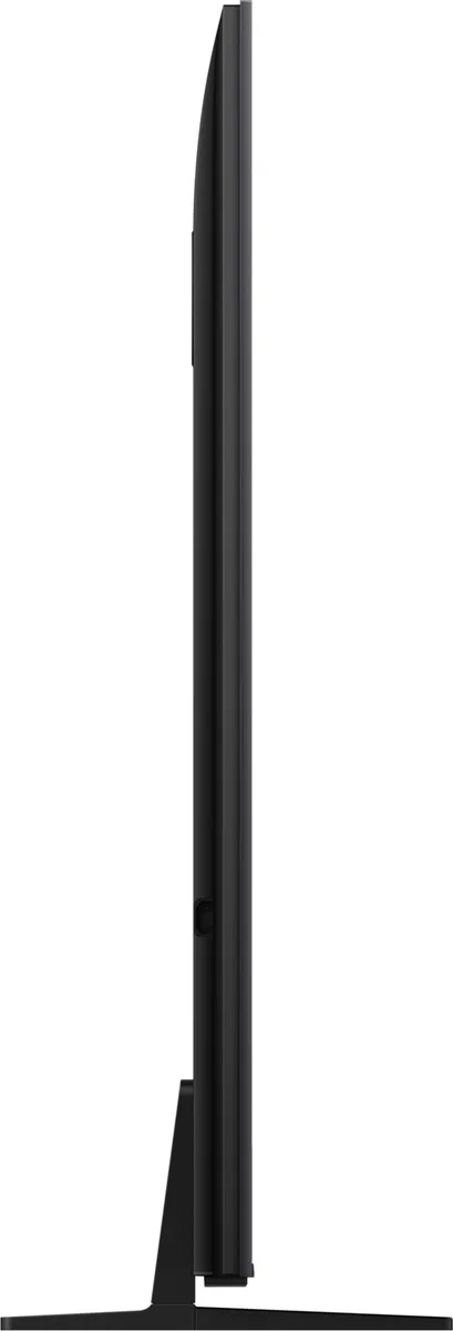 Vue de profil du TCL 65C6K PRO posé sur un pied, mettant en valeur son profil fin sur fond blanc.