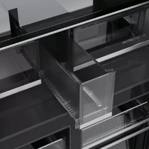 Un gros plan sur les tiroirs et compartiments transparents, au design moderne et épuré, met en valeur la fabrication haut de gamme du réfrigérateur HAIER HCW99F18DIMB.