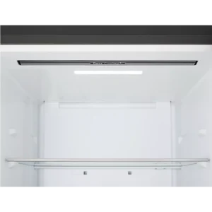 L'intérieur du réfrigérateur LG GBBSJ20DEP comprend une seule étagère en verre et un éclairage situé en haut, le tout dans un compartiment vide.